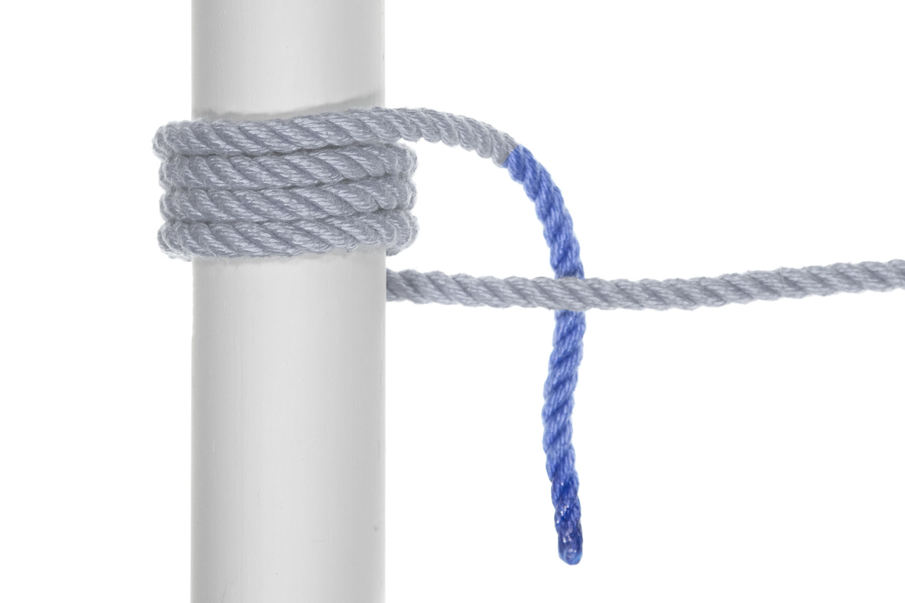 The working end of the rope crosses behind the standing part.