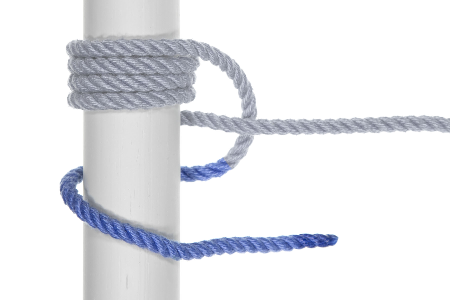 The working end passes behind the pole, makes a 180 degree turn around it, and comes out on top of the pole, facing to the right. The working end is below the rest of the rope.